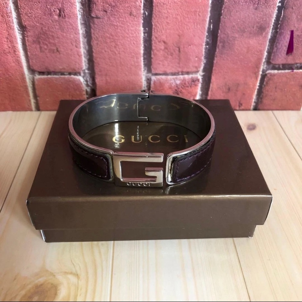 SOLD- Gucci Silver and Black Leather Cuff Bracelet